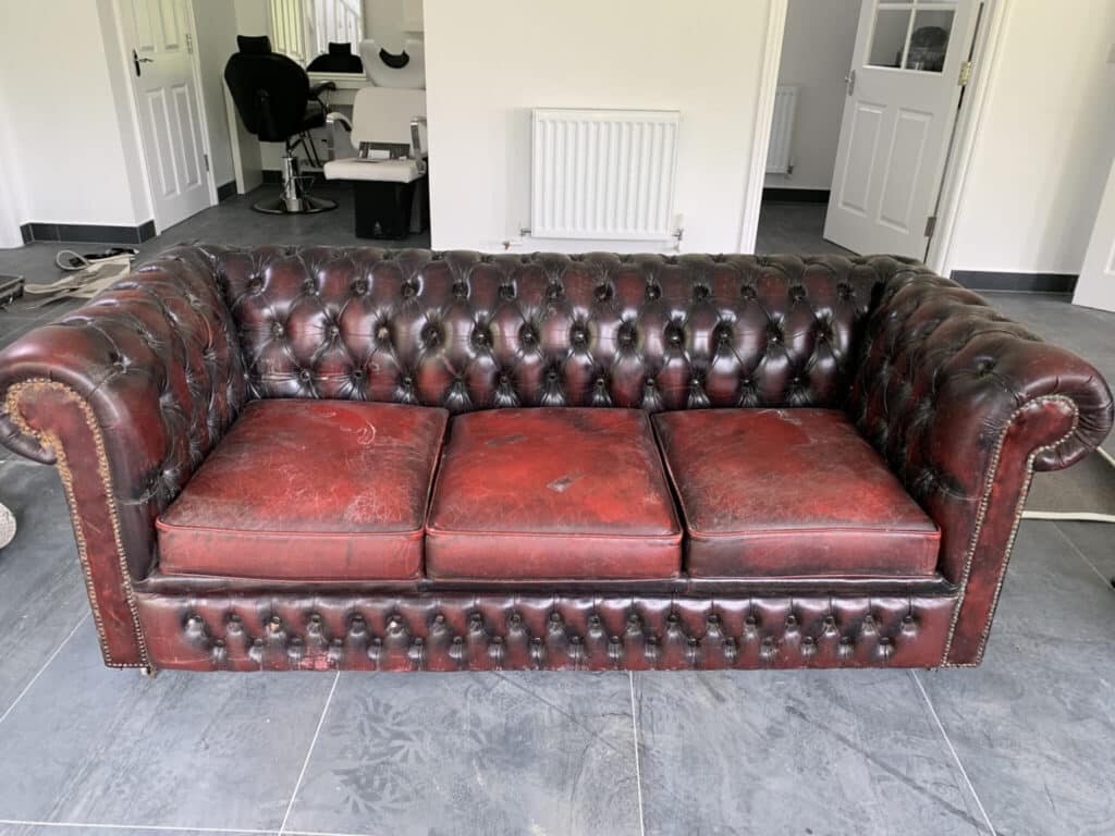 chesterfield sofa restoration cost (before repair by The Leather Expert)